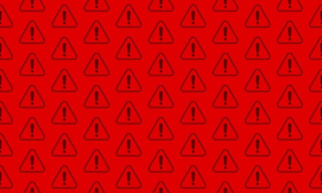 Triangular exclamation mark warning sign seamless pattern background