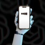 white robotic hand holding a phone with OpenAI's GPT-4o on the screen