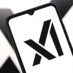 The xAI logo displayed on a smartphone screen.