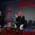 Bollywood director, screenwriter and music composer Sanjay Leela Bhansali (L) along with American businessman and co-chief executive officer of Netflix, Ted Sarandos.