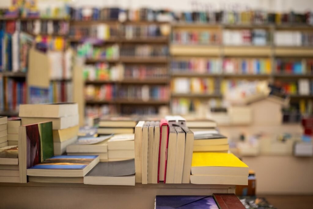 Interior of a modern bookstore with variety of books stacked all around.