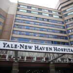a file photo from 2014 of the outside facade of Yale New Haven Hospital in Connecticut