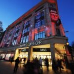 LONDON, ENGLAND - NOVEMBER 26: General view of shoppers walking past the entrance to the Marks & Spencer store on Oxford Street on November 26, 2009 in London, England.