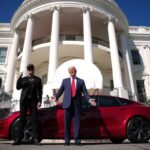 U.S. President Donald Trump and White House Senior Advisor, Tesla and SpaceX CEO Elon Musk deliver remarks next to a Tesla Model S on the South Lawn of the White House on March 11, 2025 in Washington, DC.