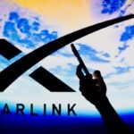 In this photo illustration, the Starlink logo is seen