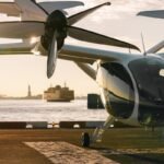 Joby Aviation EVTOL parked on tarmac next to water