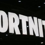 The logo of the video game" Fortnite is displayed during the 'Paris Games Week' on October 25, 2018 in Paris, France.