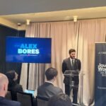 Alex Bores speaking at an event in Washington, D.C., on November 17, 2025.