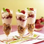 Strawberries and granola yogurt parfaits