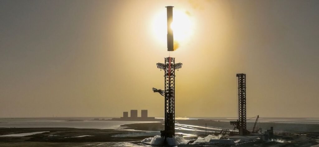 SpaceX's Starship booster landing at the company's Starbase facility in South Texas