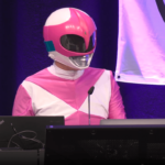 Hacker Martha Root on the stage of the Chaos Communication Congress (39C3) in Hamburg, Germany, an annual cybersecurity conference.