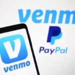 Venmo logo, a mobile payment service of PayPal is seen displayed on a smartphone and a PC screen.