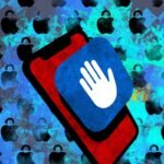 An illustration of a blue Lockdown Mode icon on a red phone on a blue background featuring Apple logos with padlocks.