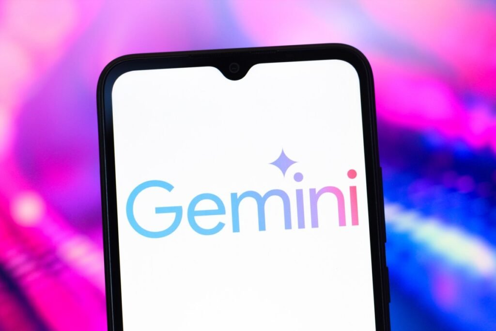 The Google Gemini AI logo is seen displayed on a smartphone screen.