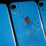 Smashed Iphones are seen during COP28 in Dubai, United Arab Emirates on November 30, 2023.