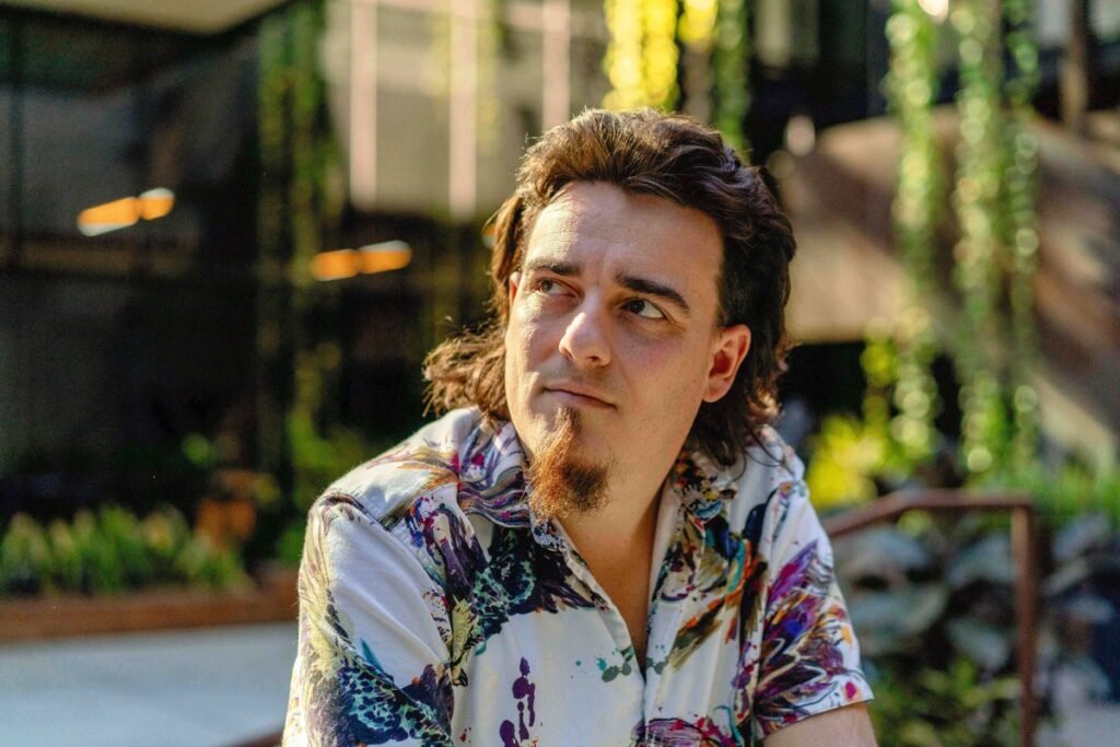 Palmer Luckey, founder of Anduril Industries, during an interview on "The Circuit with Emily Chang" at Anduril's headquarters in Costa Mesa, California, US, on Thursday, Dec. 14, 2023. Anduril recently beat several legacy defense players in a contest for a major contract to develop an unmanned fighter jet for the US Air Force and is now valued at $8.5 billion. Photographer: Kyle Grillot/Bloomberg via Getty Images