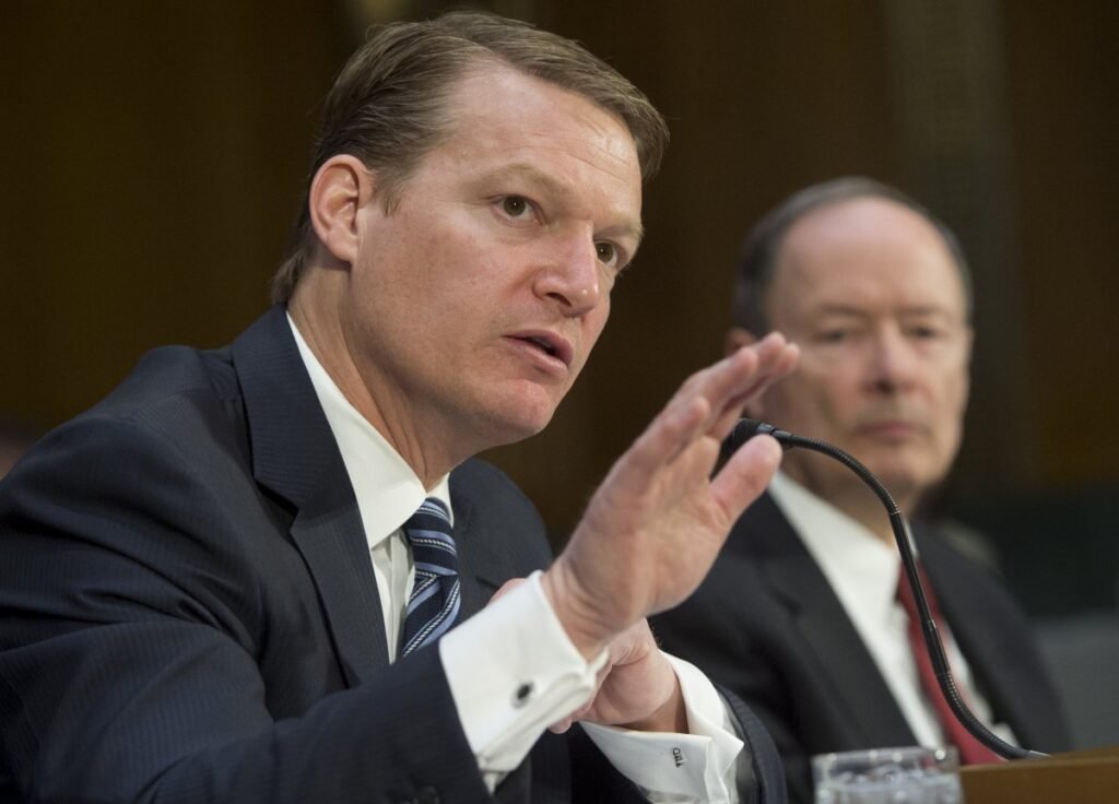 FireEye's chief executive testifying in Congress next to the former NSA director.