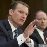 FireEye's chief executive testifying in Congress next to the former NSA director.