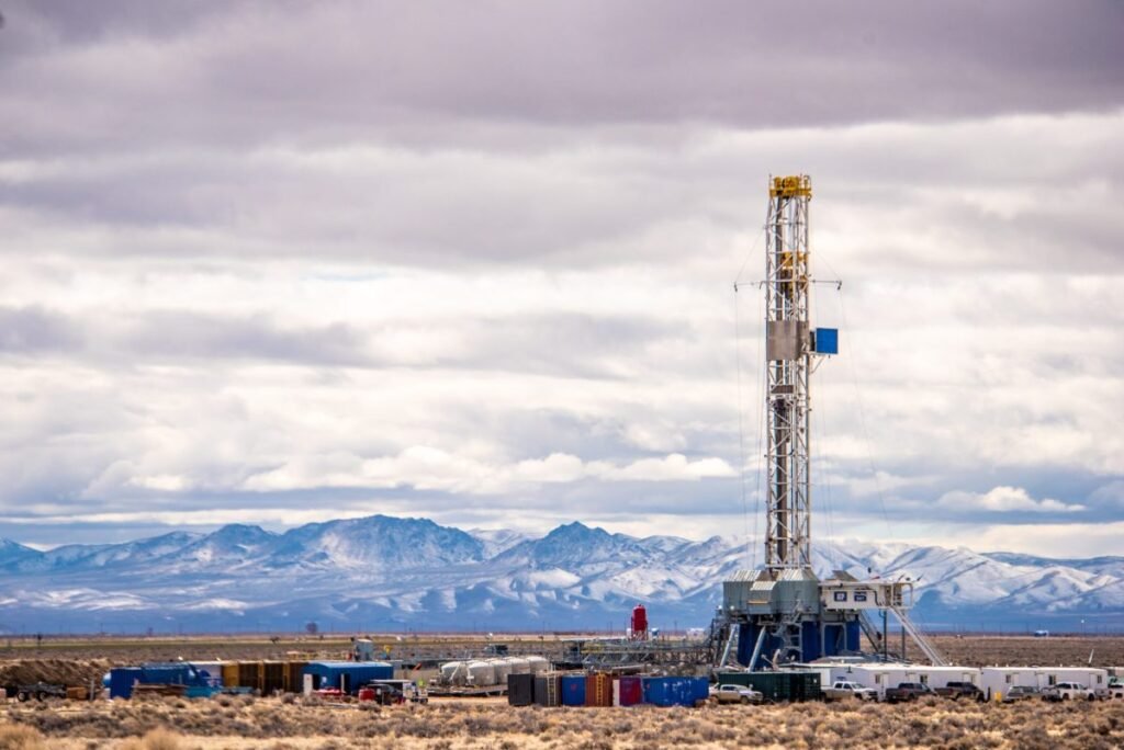A drilling rig bores into the Earth to tap geothermal energy.