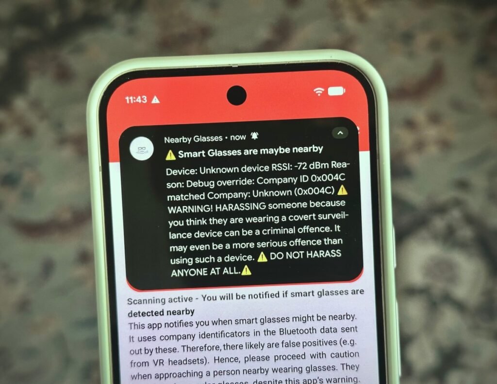 a photo showing the Nearby Glasses app and an alert notification on an Android device