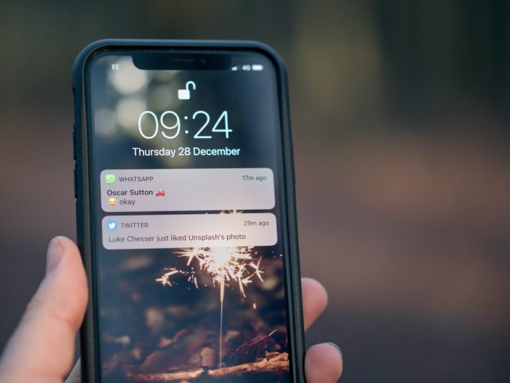 A picture showing an iPhone and two pop-up notifications.