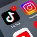 Various social apps on mobile phones: Tiktok, Instagram, Facebook, Xiaohongshu, YouTube, WeChat, Instagram