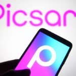 The Picsart logo on a phone