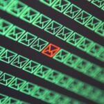 red email envelope in a sea of green email envelopes