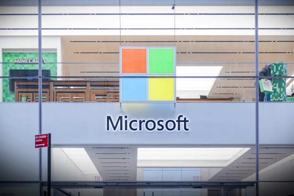 A Microsoft store entrance with the company's logo on top in midtown Manhattan