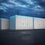 Battery packs from GM rendered against a darkened sky.