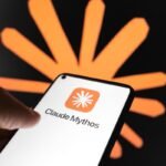 The Claude Mythos logo appears on a smartphone screen, and the Claude AI logo displays as the background on a laptop computer screen.
