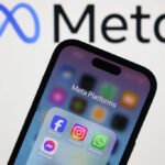 Meta logo displayed on a laptop screen and Facebook, Instagram, WhatsApp and Messenger icons displayed on a phone screen are seen in this illustration photo.